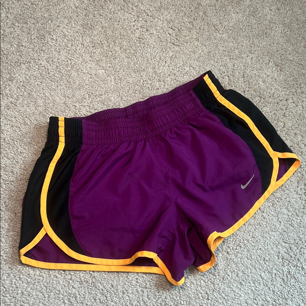 Nike Women's Athletic Shorts in Purple and Black with Orange Trim